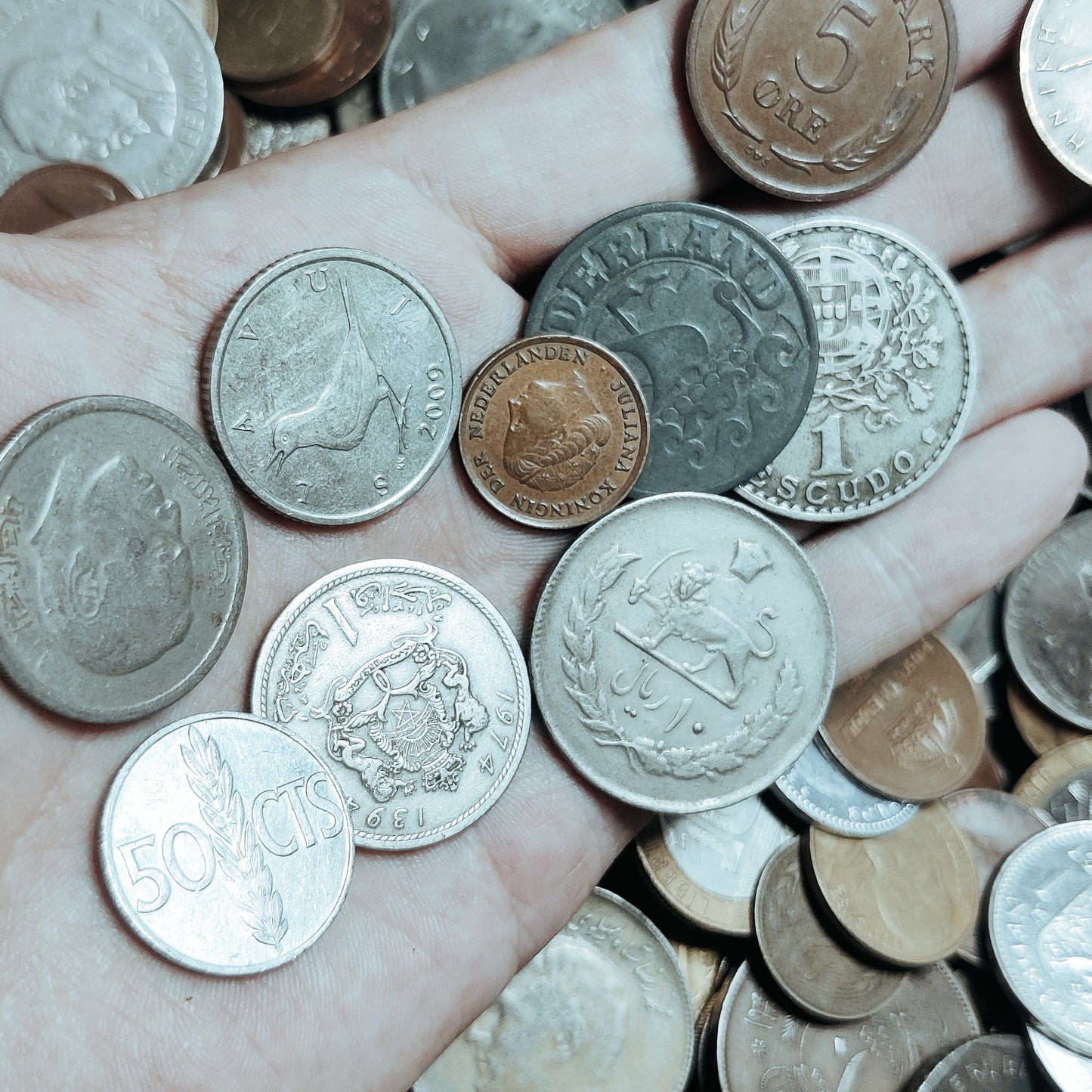 Mixed assortment of World coin bags .