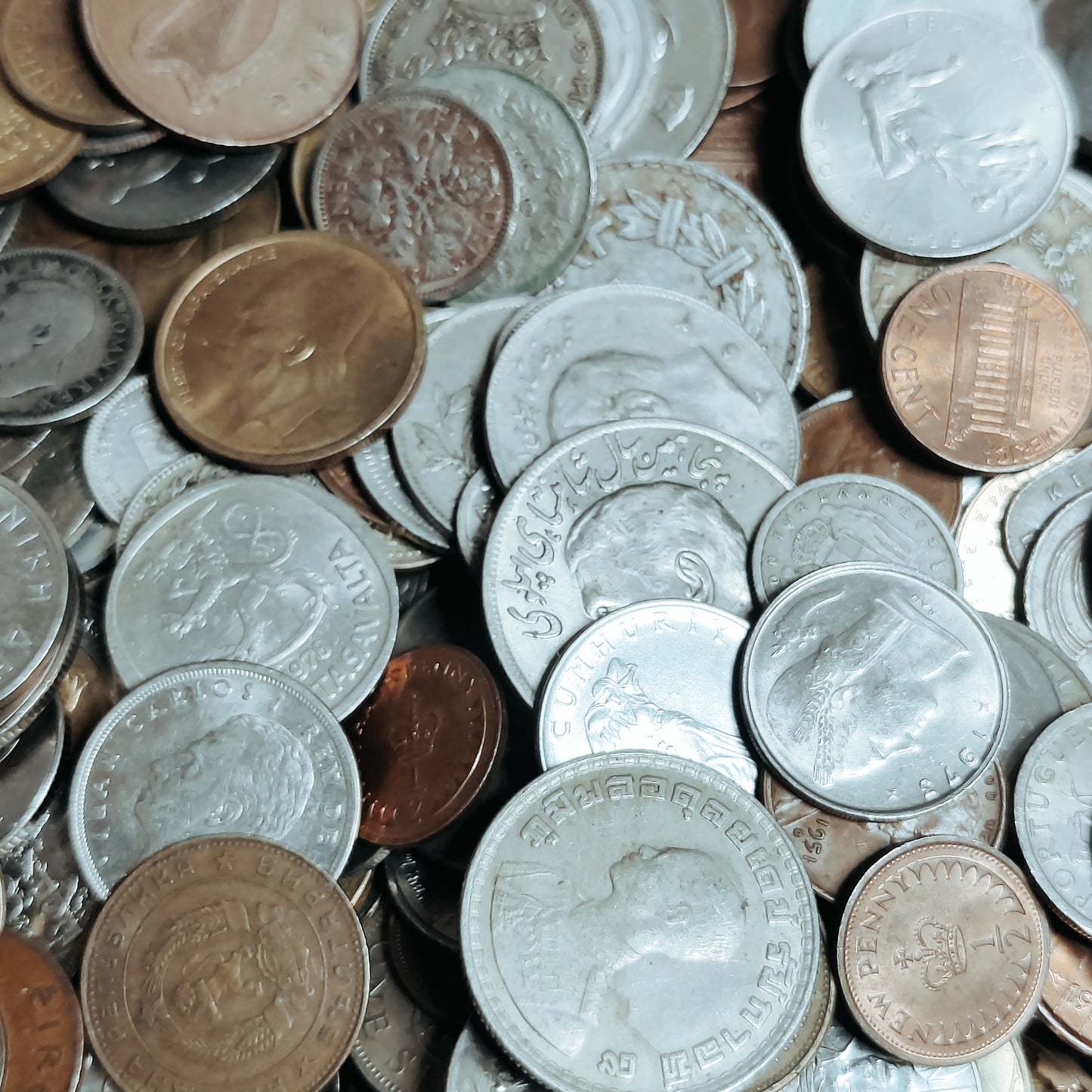 Mixed assortment of World coin bags .